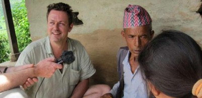 Dr. Mark Turin discussing the Thami language grammar, in Sindhupalcok, Nepal, August 2012